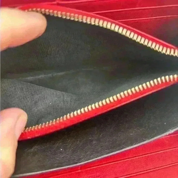 Red YSL long zippy wallet. Calfskin Leather. In GUC. Minor wear. Comes with COA - Picture 8 of 14